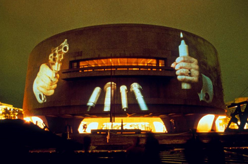 Projection onto The Hirshhorn Museum, Washington D.C, Krzysztof Wodiczko, 1988